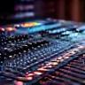 Live sound mixing board representing live sound engineering.